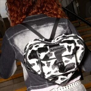 Cow print Doc Marten Heart-Shaped Black and White Backpack/over the shoulder bag